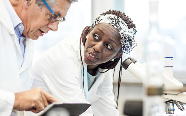 Two Scientists In Laboratory