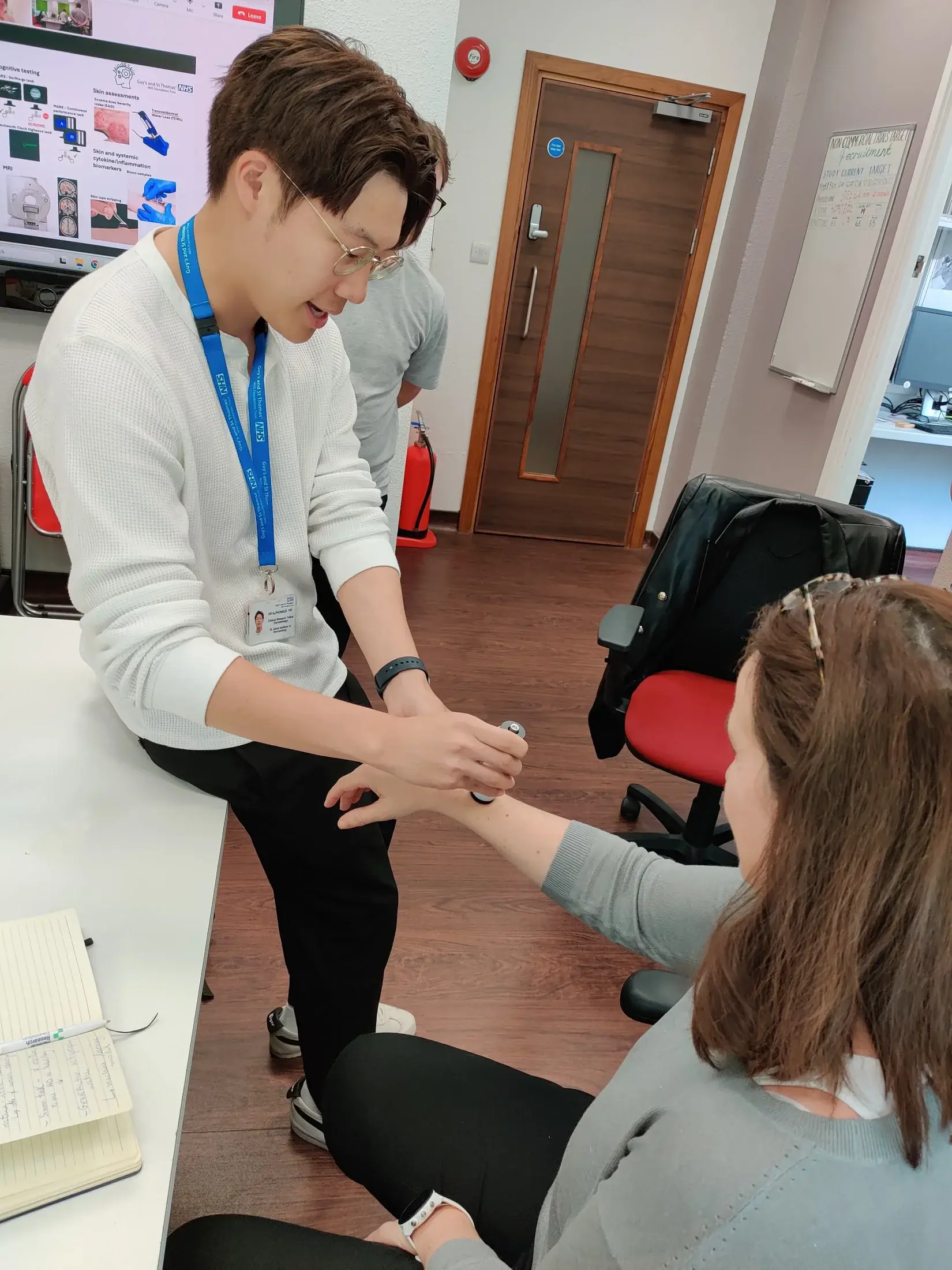 A researcher in Casten's lab does a skin test