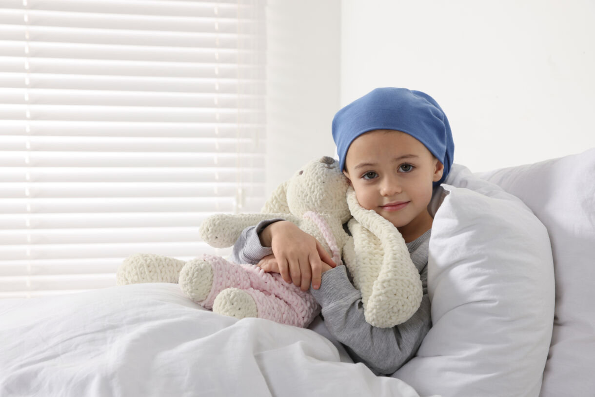 Childhood cancer Girl with toy bunny in hospital 1775179429 2123x1416