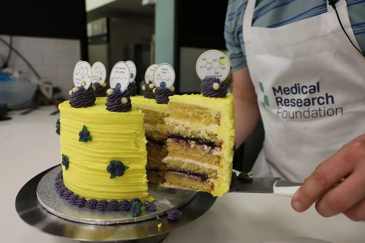 Josh Smalley's lemon and blueberry cake being cut into