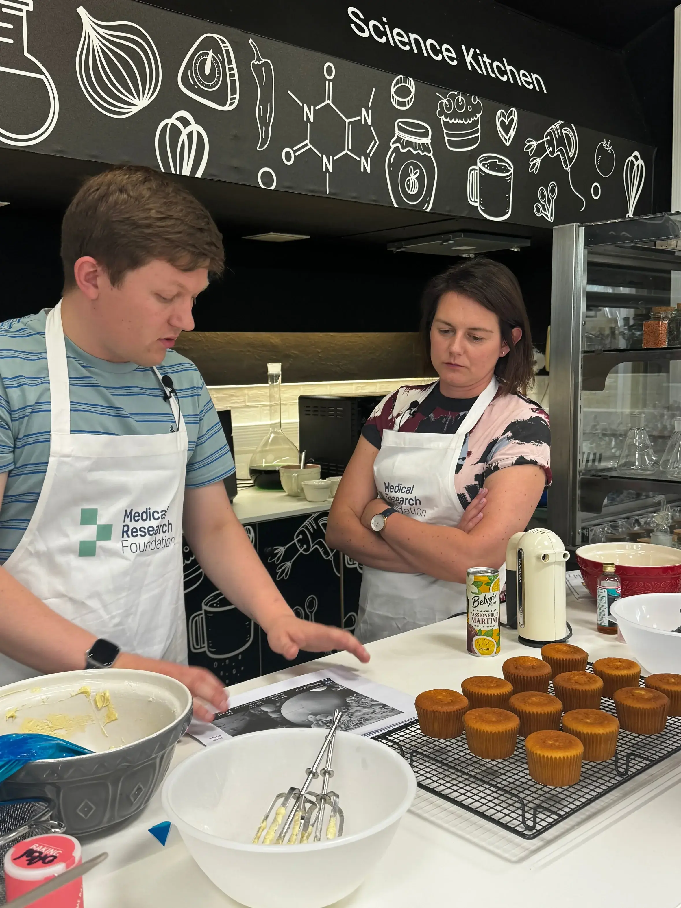 Josh and Lavinia baking cupcakes in the science kitchen